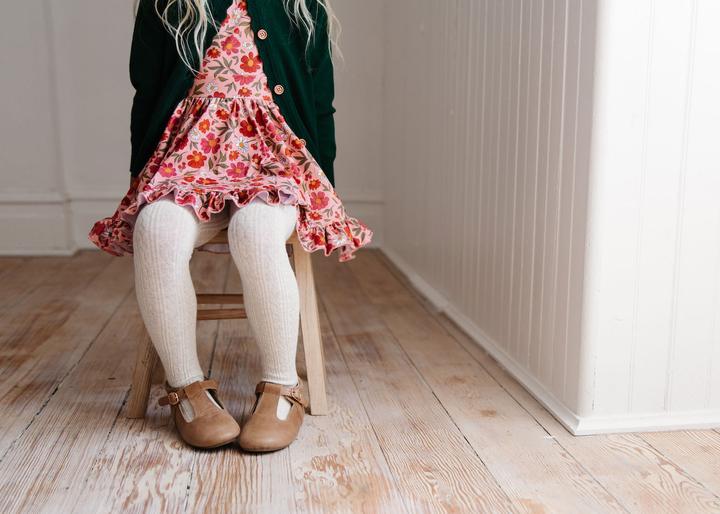 https://www.lovemedobaby.com/cdn/shop/products/little-stocking-co-heathered-ivory-tights-lifestyle.jpg?v=1633537364